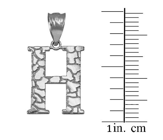 Silver letter H pendant with a textured stone-like pattern, shown next to a 1-inch cm size scale on a white background.