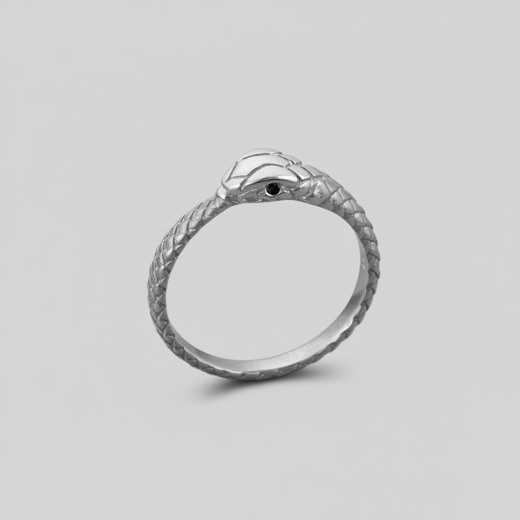silver ouroboros snake ring with black diamond eyes