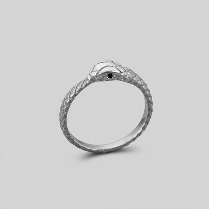 silver ouroboros snake ring with black diamond eyes