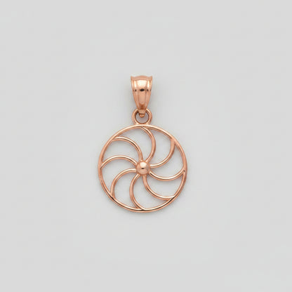 Rose gold circular pendant on a white background