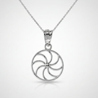 Silver circular pendant necklace on a white background