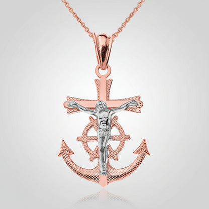 Rose gold anchor pendant with silver Jesus Christ figure on a white background