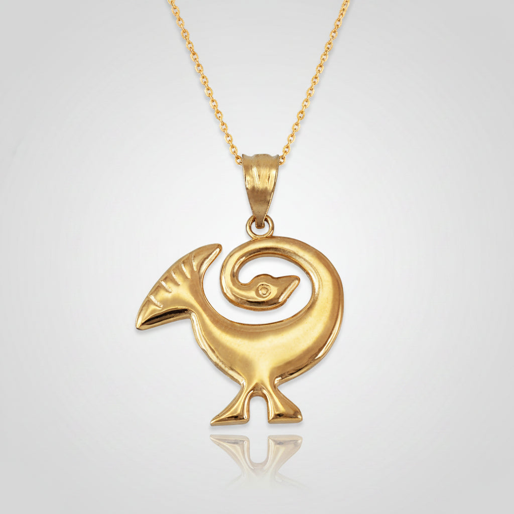 Gold pendant with a unique design on a white background