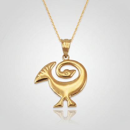 Gold pendant with a unique design on a white background