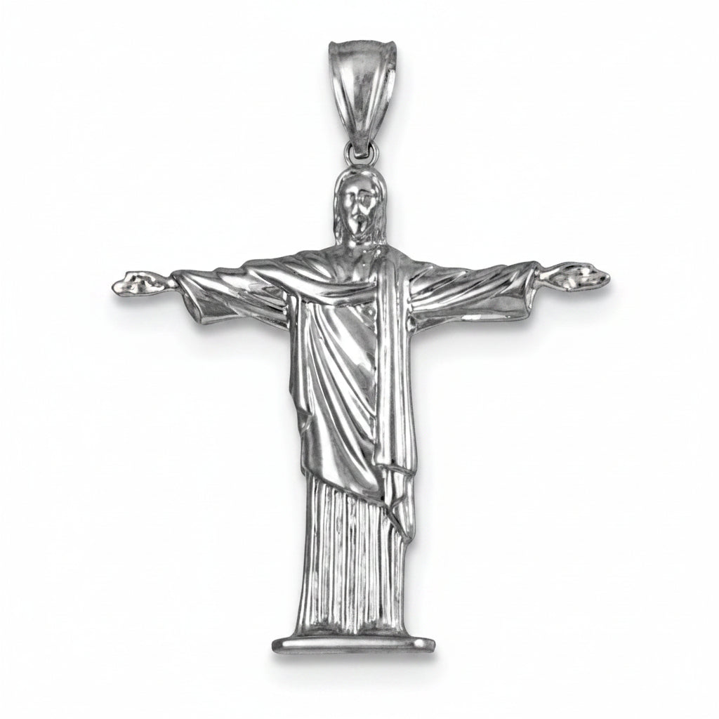 Silver pendant of a religious figure with outstretched arms on a white background