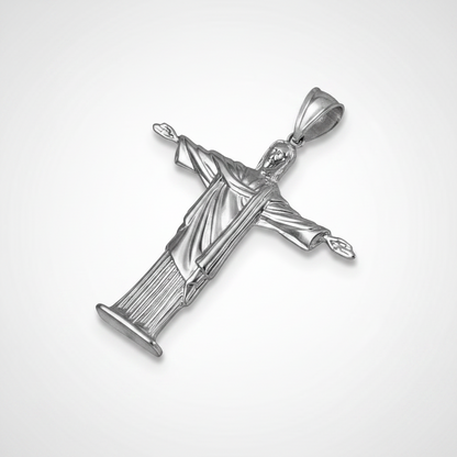 Silver crucifix pendant on a white background