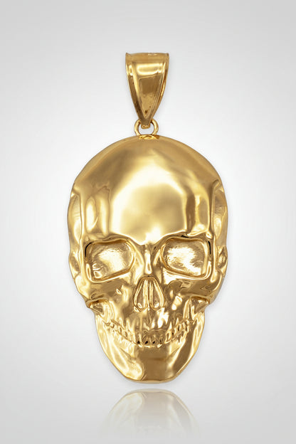 Gold skull pendant