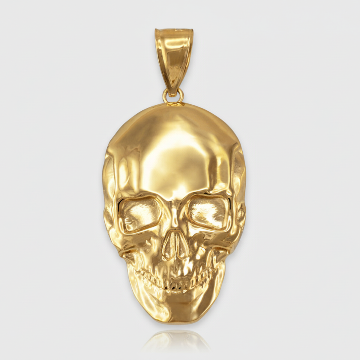 Gold skull pendant