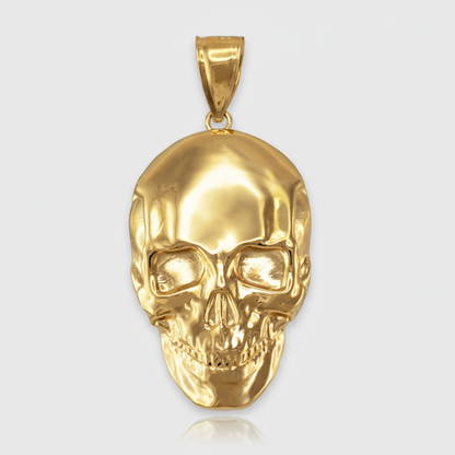 Gold skull pendant