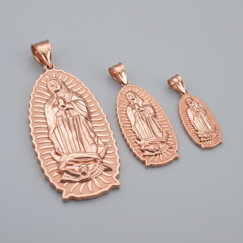 Set of rose gold religious pendants on a black background