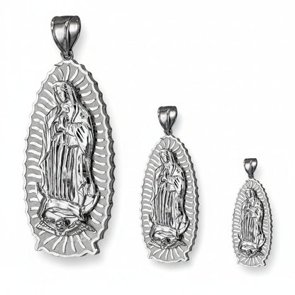 Set of three sterling silver Our Lady of Guadalupe Virgin Mary pendants on white background