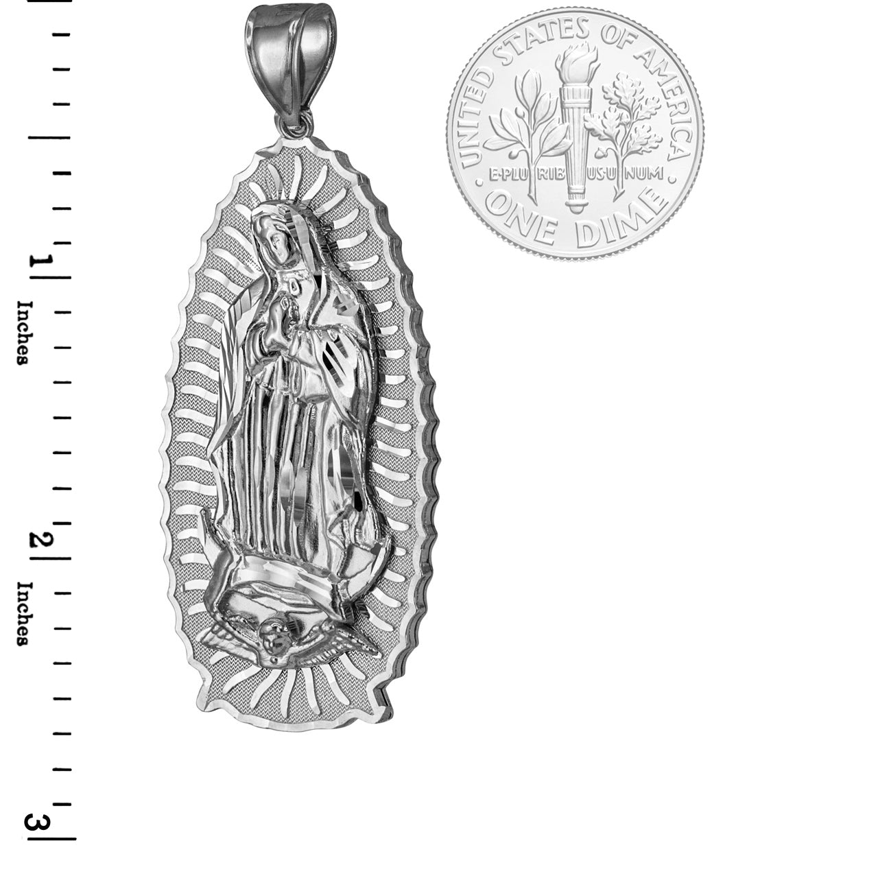 Silver pendant of Our Lady of Guadalupe with a dime for scale on a white background