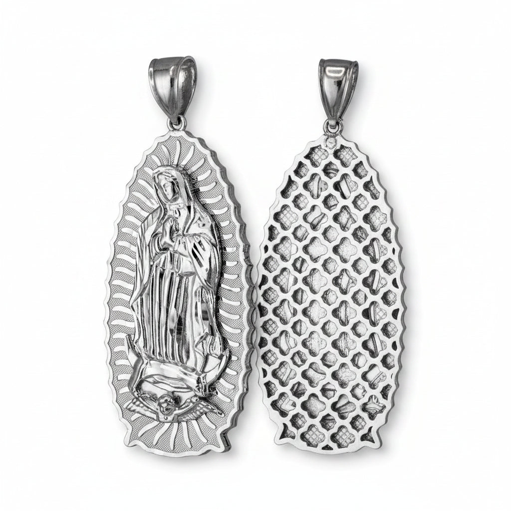 Silver pendant with religious design on a white background