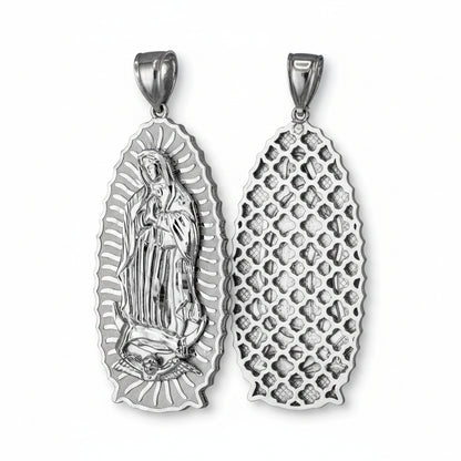 Silver pendant with religious design on a white background
