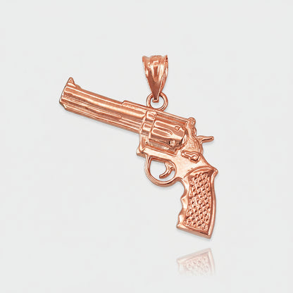 Rose gold revolver pendant on a white background