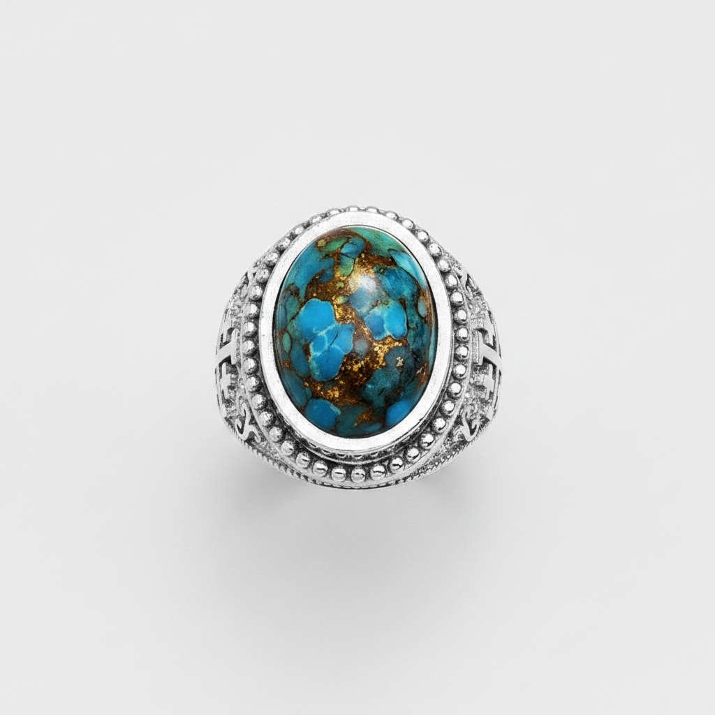 A sterling silver ring featuring a large oval turquoise cabochon with natural brown matrix veining, set in a wide band with decorative textured silver sides.