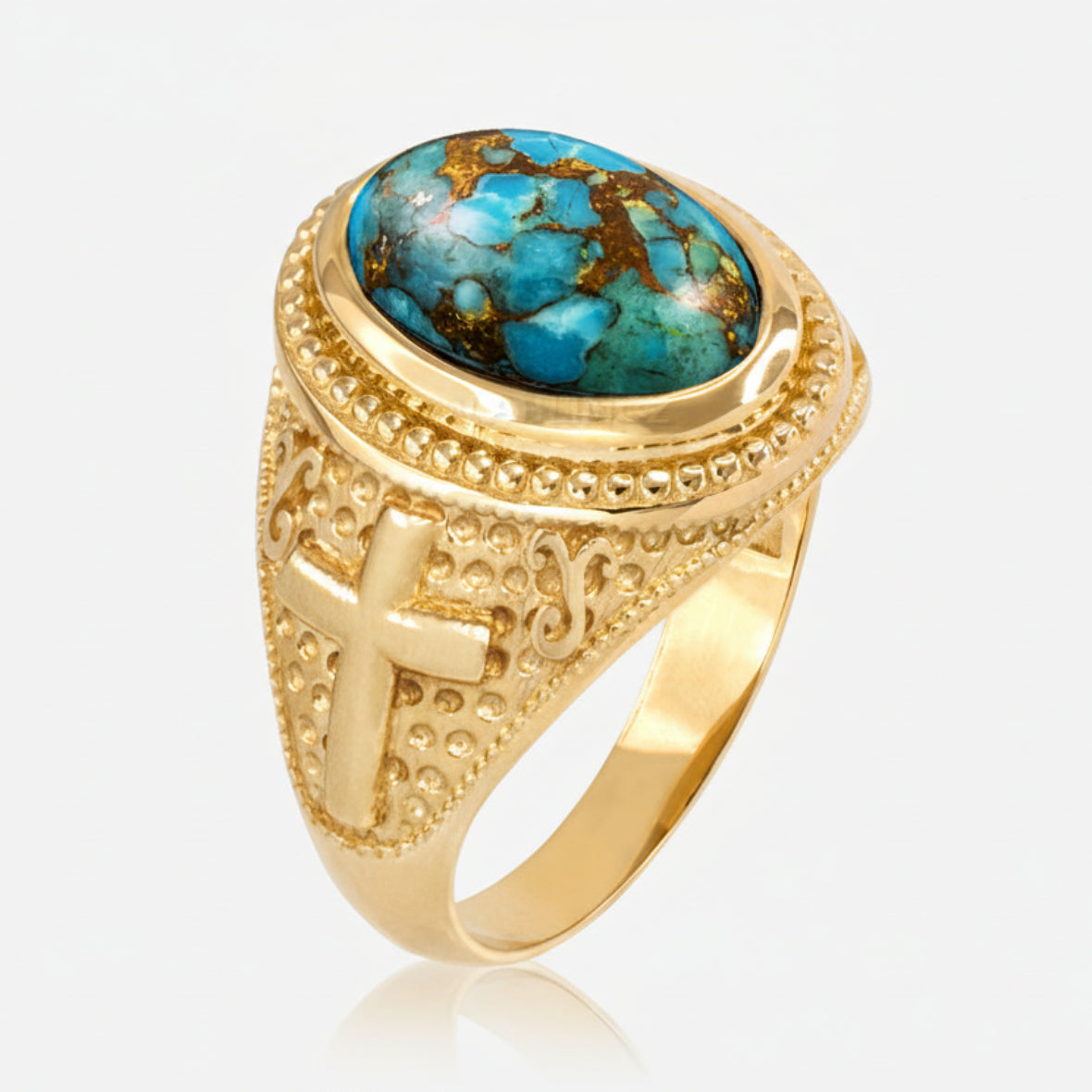 Gold ring with turquoise stone on a white background