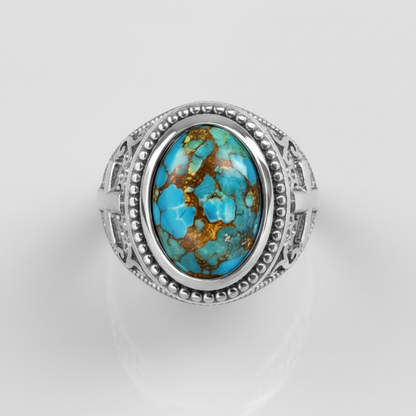 Ring with turquoise stone and silver band on a white background