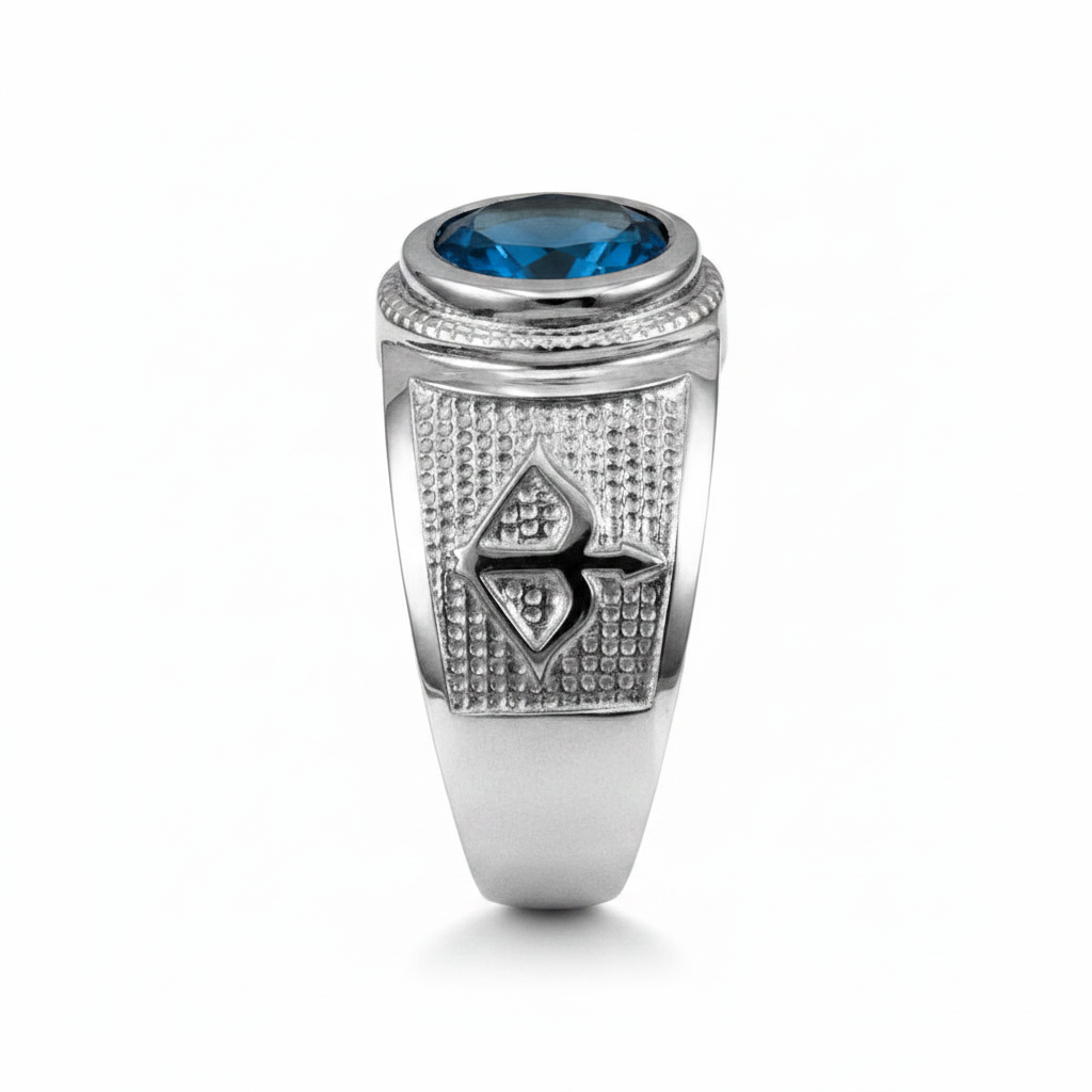 Silver ring with blue gemstone on a white background