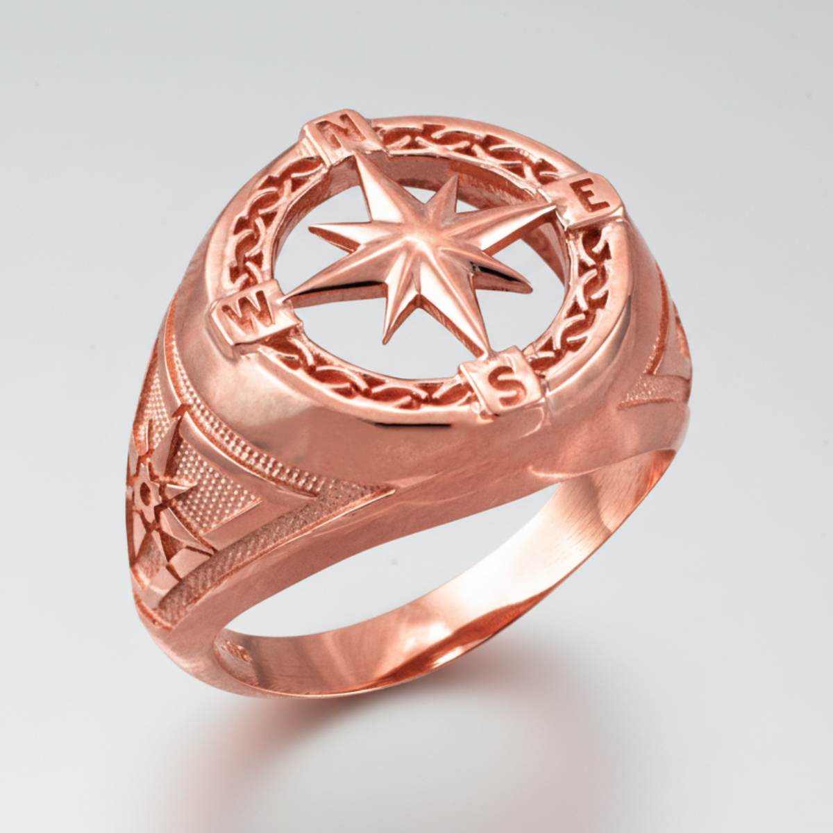 Rose gold ring with star design