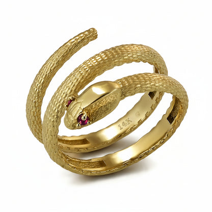 Textured yellow gold coiled snake wrap ring with ruby eyes, available in 10K or 14K.
