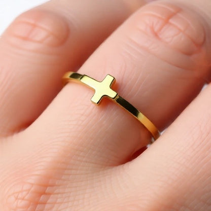 Karma Blingz yellow gold sideways cross stacking ring for women, dainty faith jewelry.