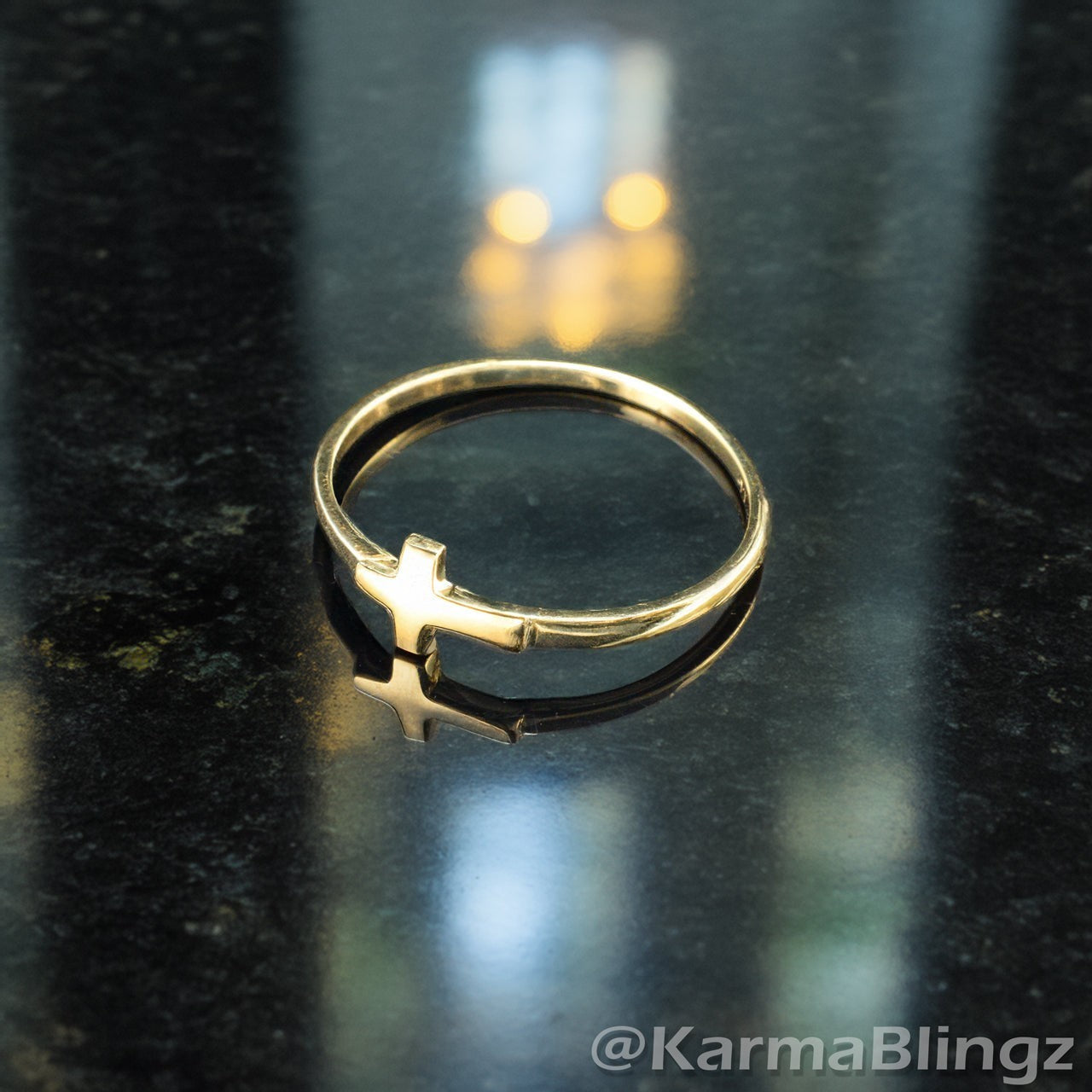 Karma Blingz yellow gold sideways cross stacking ring for women, dainty faith jewelry.