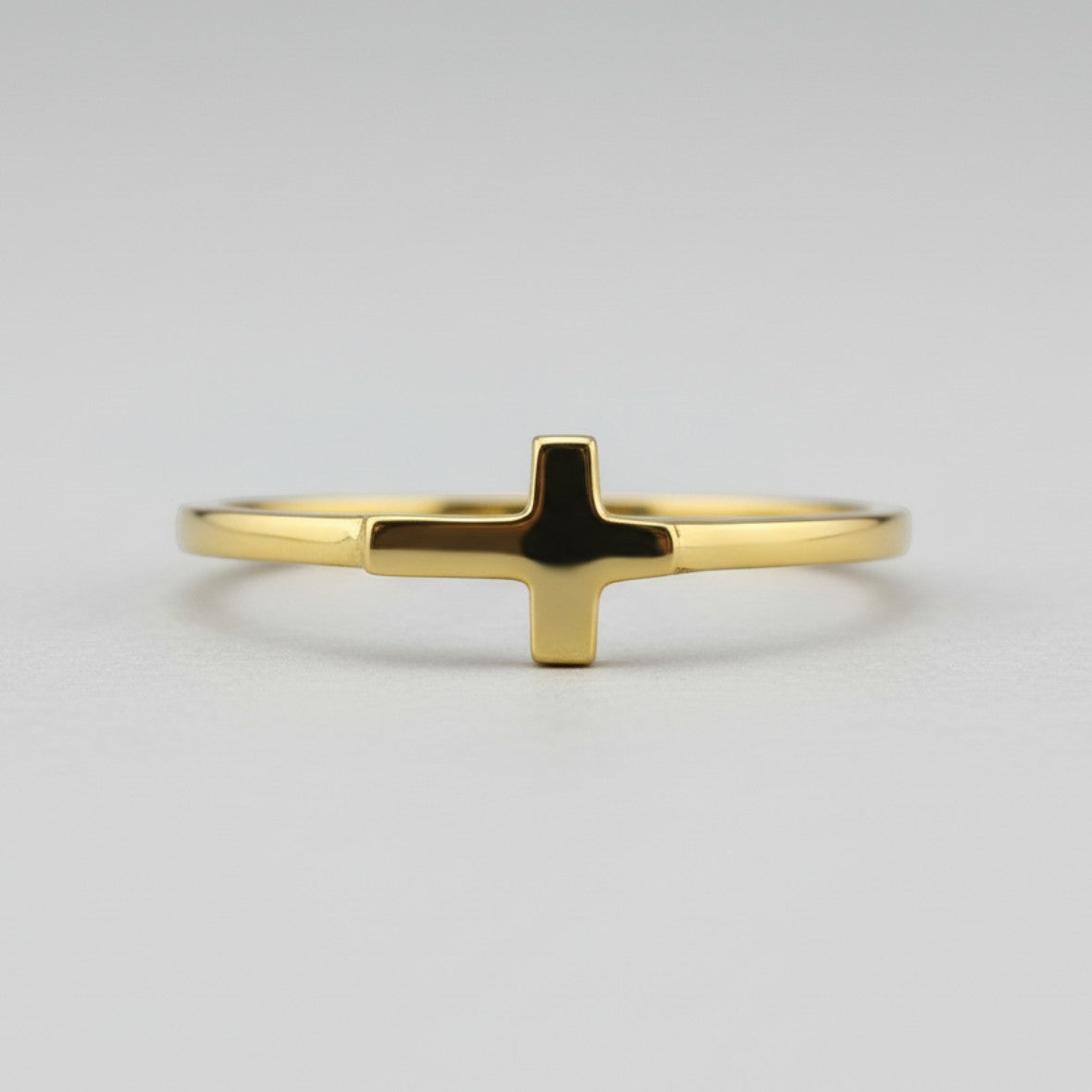 Karma Blingz yellow gold sideways cross stacking ring for women, minimalist faith jewelry.