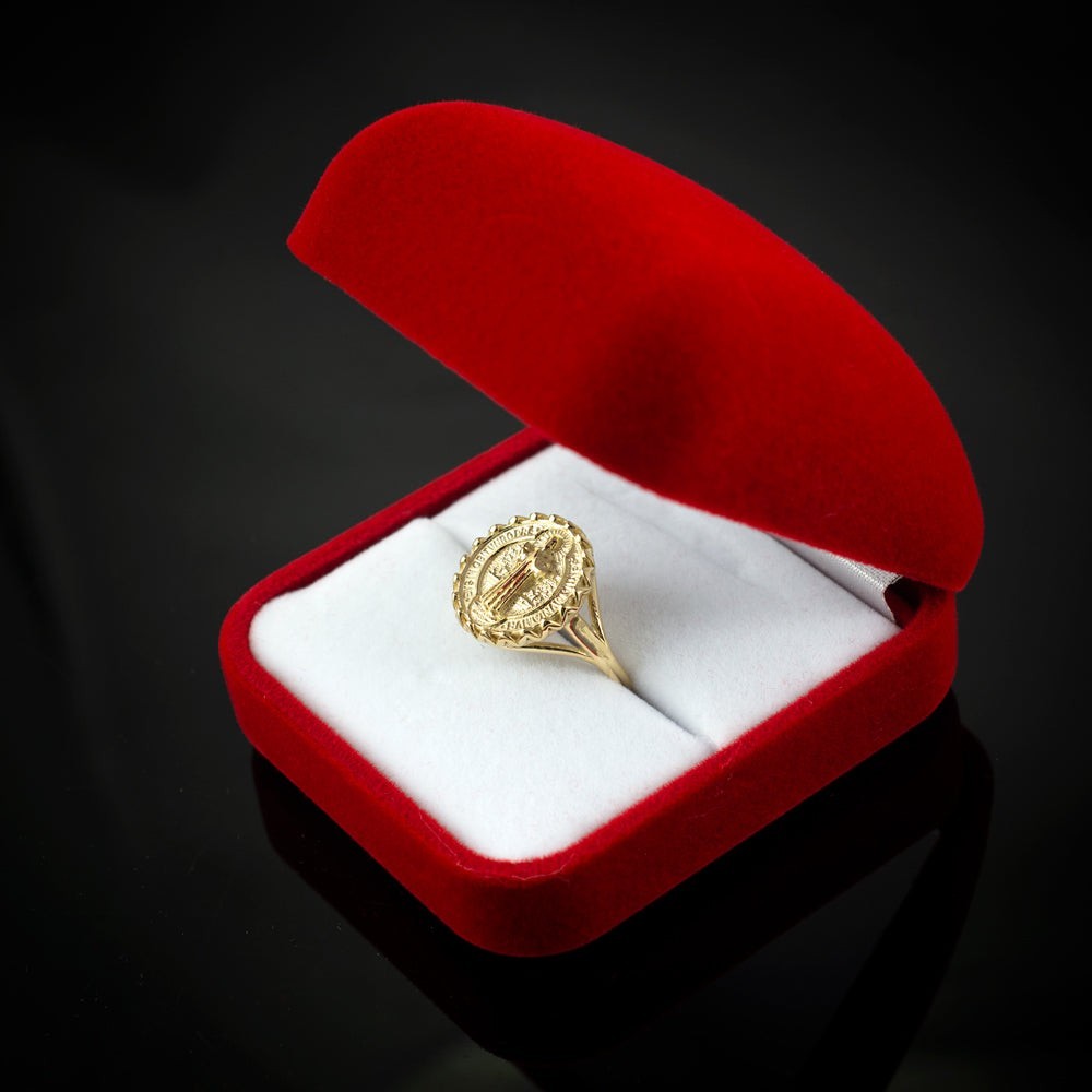 Karma Blingz gold St. Benedict coin medallion ring for women, oval design with intricate detailing.