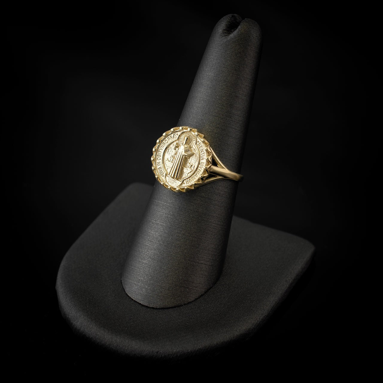 Karma Blingz yellow gold St. Benedict coin medallion ring for women, featuring a detailed Saint Benedict image and intricate detailing around the coin.
