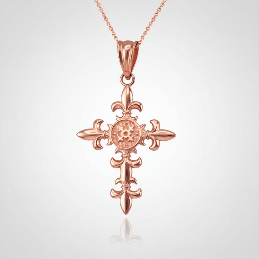 Karma Blingz rose gold fleur de lis cross pendant necklace with polished finish and textured center detail.