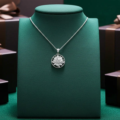 Karma Blingz sterling silver lotus flower pendant necklace on a rolo chain, polished finish.