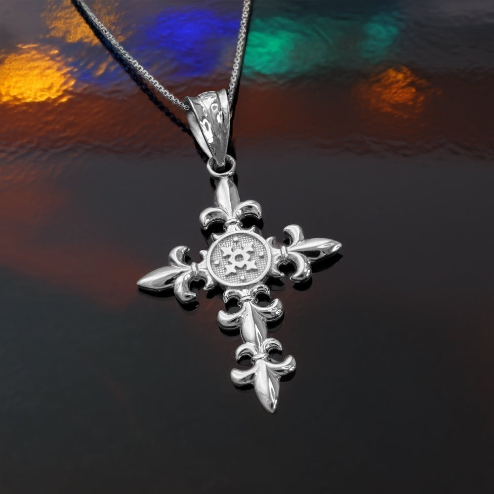 Karma Blingz white gold fleur de lis cross pendant necklace with textured center detail and rolo chain.