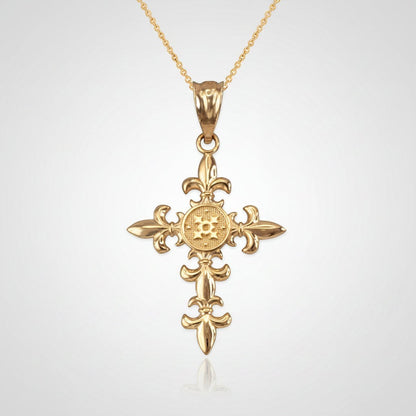 Karma Blingz yellow gold fleur de lis cross pendant necklace with polished finish and textured center detail.