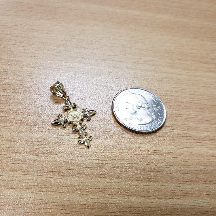 Karma Blingz yellow gold Fleur De Lis cross pendant necklace with polished finish and textured center detail.