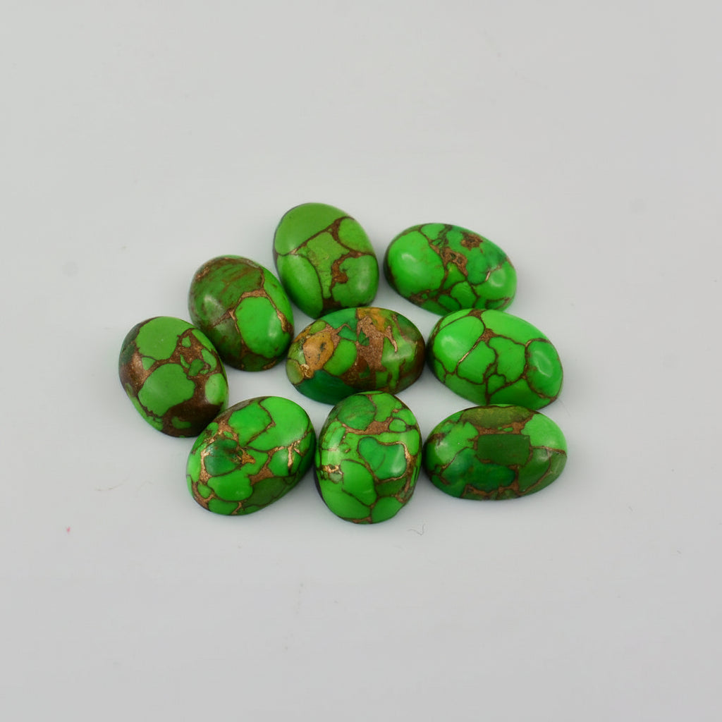 Nine polished green stone cabochons with brown and gold matrix veining, arranged in a small cluster on a light gray background.